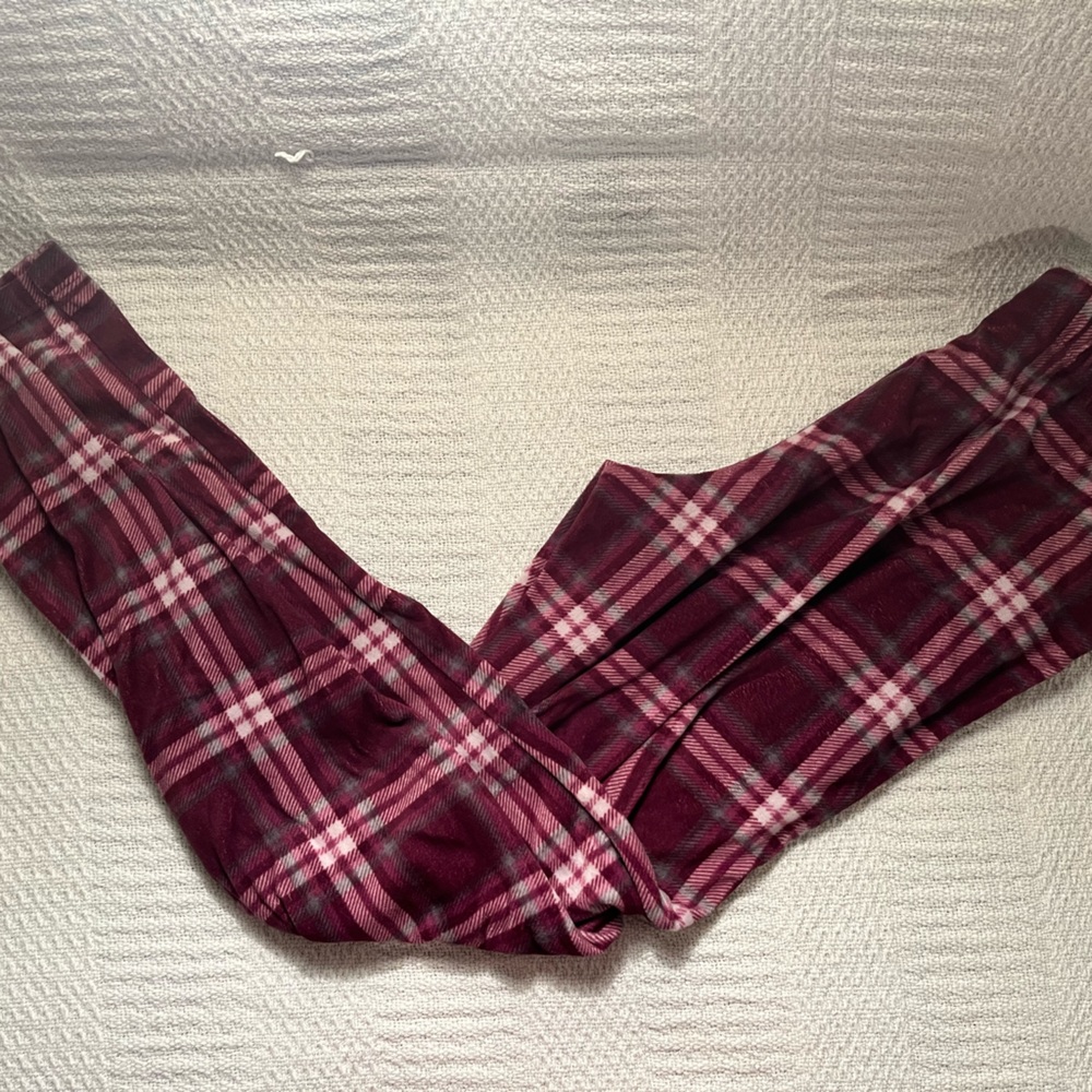 I’m selling purple and pinkish pajama pants.